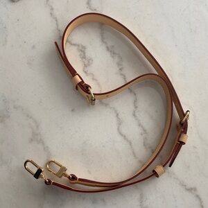Louis Vuitton Tan and Brown adjustable pocketbook strap. Brand new-never used
